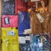 The photo shows a package with clothing in the category AR.