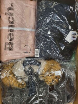 The photo shows a package with clothing in the category AJW.