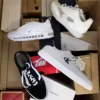 The photo shows a package with footwear in the category CS.