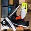 The photo shows a package with footwear in the category CS.