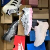 CS7054 2 The photo shows a package with footwear in the category CS.