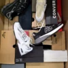 The photo shows a package with footwear in the category CS.