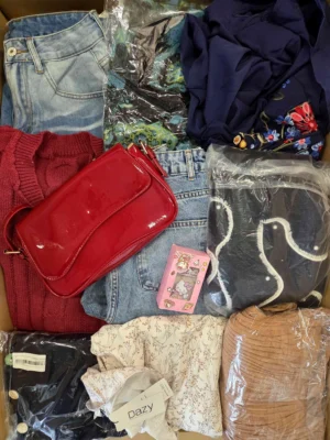The photo shows a package with clothing in the category SN.