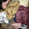 The photo shows a package with clothing in the category SN.