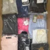 The photo shows a package with clothing in the category AP.