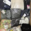 The photo shows a package with clothing in the category AP.