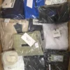 The photo shows a package with clothing in the category AP.