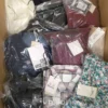 The photo shows a package with clothing in the category AP.