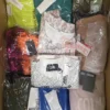 The photo shows a package with clothing in the category AP.