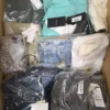 The photo shows a package with clothing in the category AP.