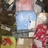 The photo shows a package with clothing in the category AP.