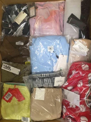 The photo shows a package with clothing in the category AP.