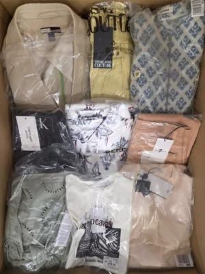 The photo shows a package with clothing in the category AP.