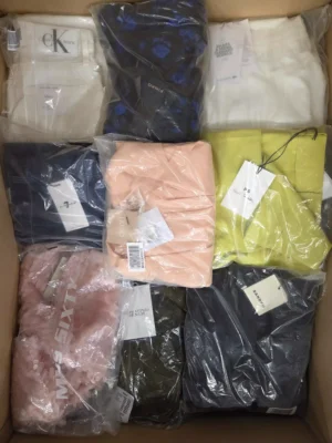 The photo shows a package with clothing in the category AP.