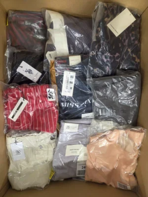 The photo shows a package with clothing in the category AP.