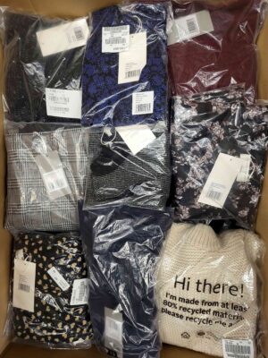 The photo shows a package with clothing in the category YA.
