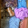The photo shows a package with clothing in the category SN.