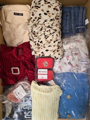 The photo shows a package with clothing in the category SN.