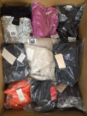 The photo shows a package with clothing in the category A.