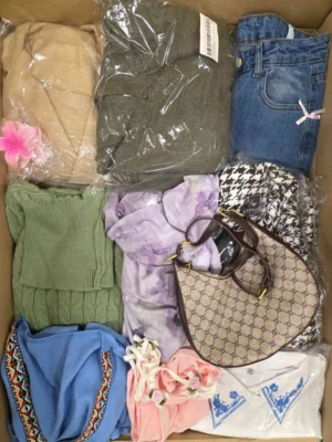 The photo shows a package with clothing in the category SN.