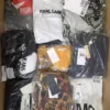The photo shows a package with clothing in the category AP.