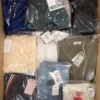 The photo shows a package with clothing in the category AP.