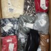 The photo shows a package with clothing in the category YA.