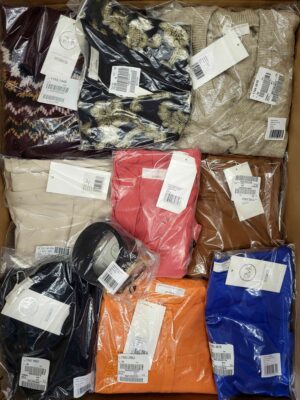 The photo shows a package with clothing in the category YA.