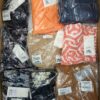 The photo shows a package with clothing in the category YA.