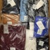 The photo shows a package with clothing in the category YA.