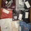 The photo shows a package with clothing in the category YA.