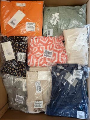The photo shows a package with clothing in the category YA.