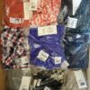 The photo shows a package with clothing in the category YA.