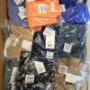 The photo shows a package with clothing in the category YA.