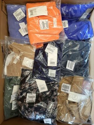 The photo shows a package with clothing in the category YA.