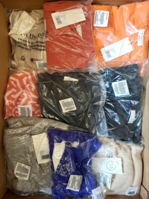 The photo shows a package with clothing in the category YA.