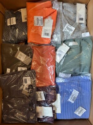 The photo shows a package with clothing in the category YA.