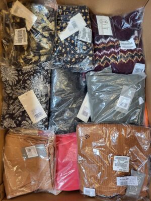 The photo shows a package with clothing in the category YA.