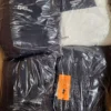 The photo shows a package with clothing in the category B.