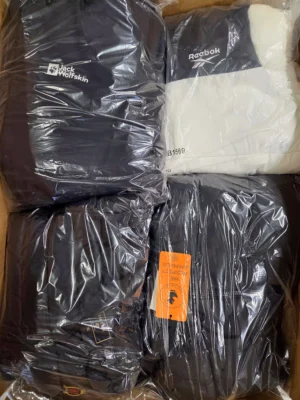 The photo shows a package with clothing in the category B.