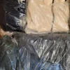 The photo shows a package with clothing in the category C.
