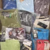 The photo shows a package with footwear in the category AS.