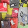 The photo shows a package with footwear in the category AS.