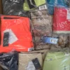 AST114 2 The photo shows a package with footwear in the category AS.