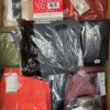 The photo shows a package with footwear in the category AS.