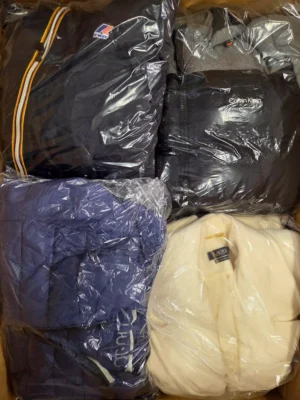 The photo shows a package with clothing in the category B.