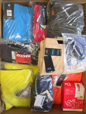 The photo shows a package with footwear in the category AS.