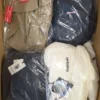 BJ117 1 The photo shows a package with clothing in the category B.