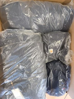 The photo shows a package with clothing in the category C.