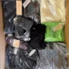ADN122 1 The photo shows a package with clothing in the category A.